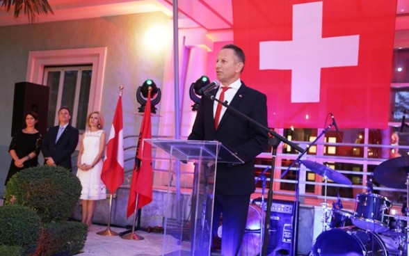 Swiss Ambassador Christoph Graf addressing guests at the reception celebrating the Swiss National Day