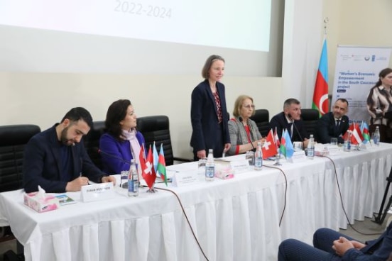 Ambassador Muriel Peneveyre and representatives of the Gusar Executive Committee, the State Committee for Family, Women and Children Affairs, and UNDP at a meeting with project beneficiaries.