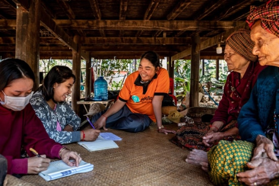 Villagers discussing community forestry as a response to the impact of Covid-19 on their livelihoods, Preah Vihear province. Cambodia.