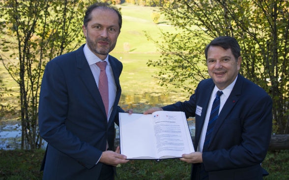 Benoît Revaz (Directeur de l'Office fédéral de l'énergie) et Raphaël Bartolt (Préfet du Doubs)