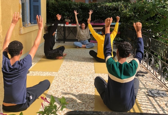 Embracing tranquility, one breath at a time. Children participating in yoga sessions .