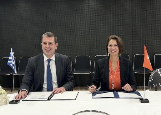 Minister of Migration and Asylum, Dimitris Kairidis, and State Secretary for Migration, Christine Schraner Burgener, during the signing ceremony at the Global Refugee Forum.