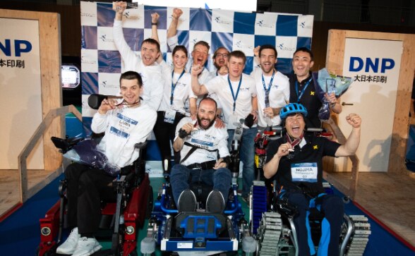 Swiss Gold medal team HSR Enhanced in the middle, together with team Caterwil from Russia on the left (silver) and Keio University’s team Fortississimo (bronze) on the right ©ETH Zurich/Takao Ochi