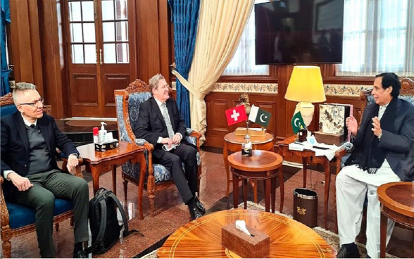 Ambassador Bénédict de Cerjat and the Deputy Head of Mission of Switzerland, Mr. Alberto Groff in a meeting with the Speaker of the Punjab Assembly, Chaudhry Pervez Elahi