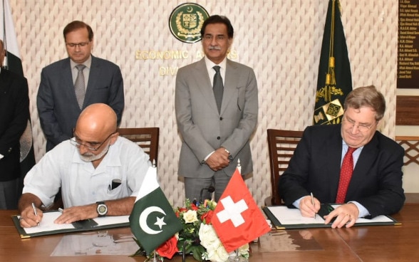 Signing of third agreement between Switzerland represented by Ambassador Bénédict de Cerjat, and the Ministry of Economic Affairs of Pakistan (EAD), represented by the Federal Secretary, Mr. Mian Asad Hayaud.