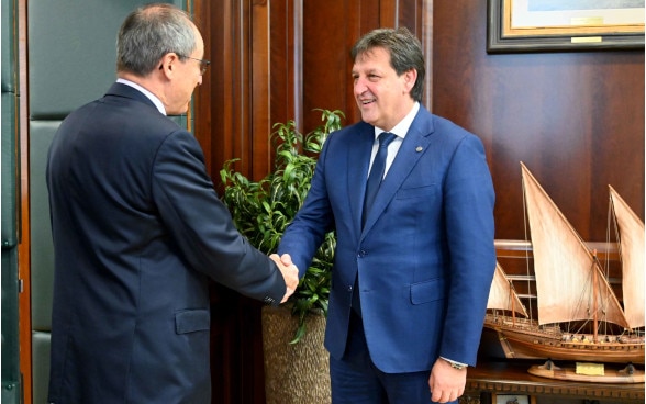 Ambassador Urs Schmid and Minister Bratislav Gasic