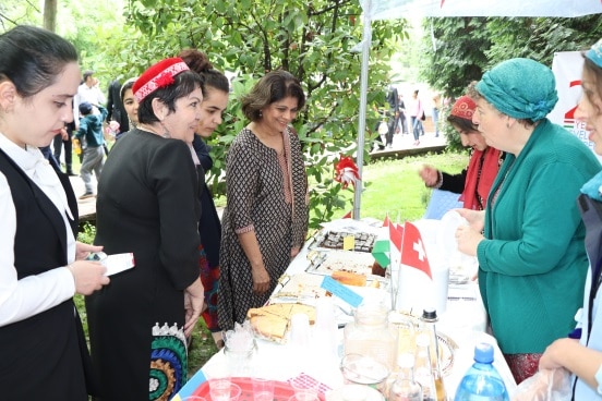 The Swiss Cooperation Office stand and table during the Food and Crafts Day in Dushanbe.