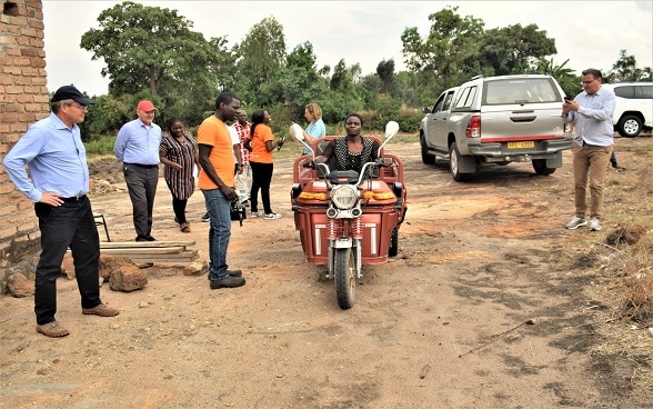 Anna Mureza, a 43-year-old mother-of-four shows off her driving skills. She uses the Hamba tricycle to carry her produce to the nearby market.