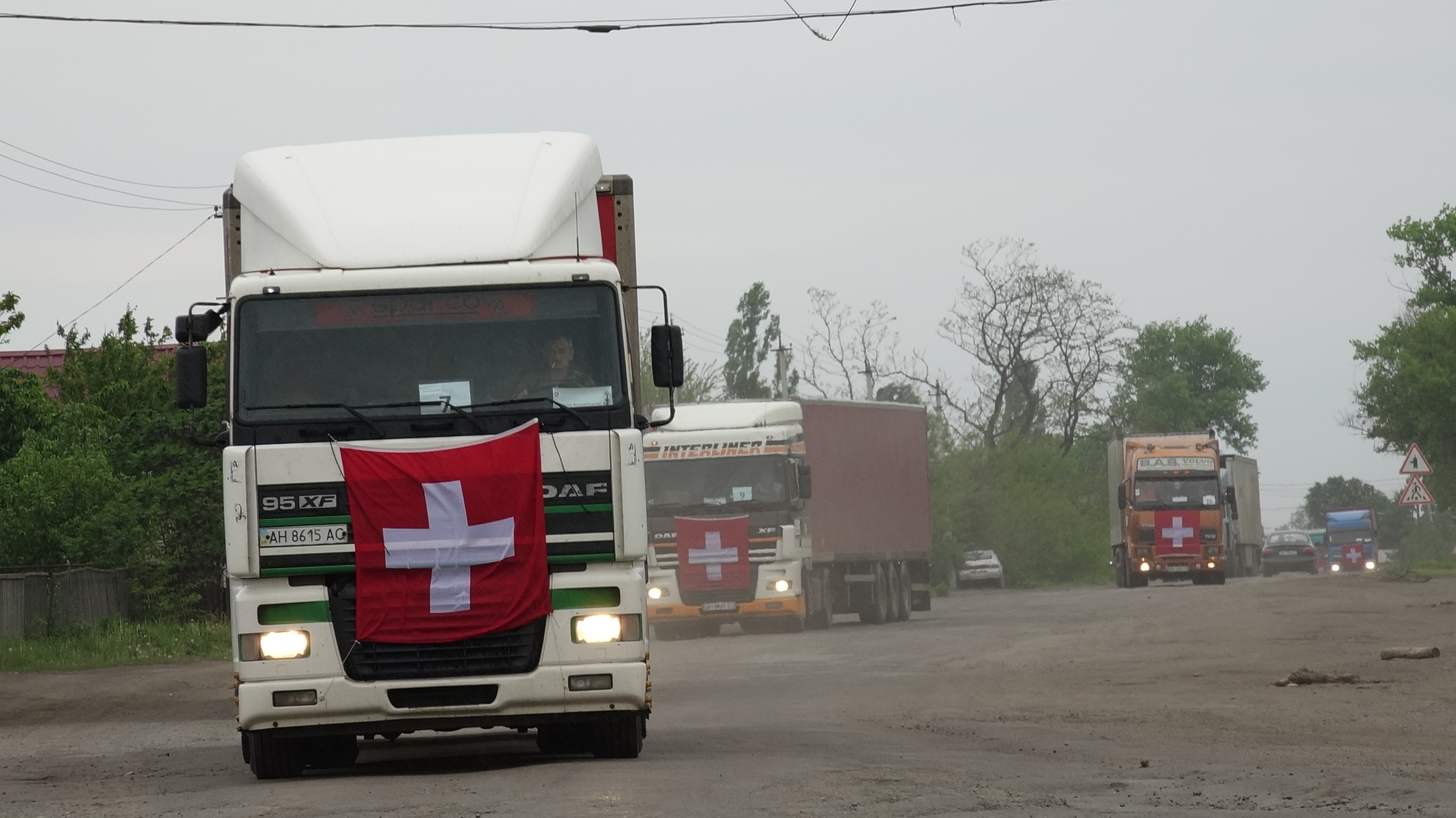 Swiss convoy to aid civilian population in eastern Ukraine reaches Donetsk. Switzerland sent a convoy carrying 300 tonnes of chemical water treatment products.