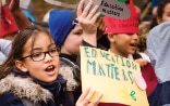 Title page of the Global Education Monitoring Report 2017 A group of children holding up a poster that says ‘Education matters’.
