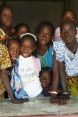 School girls in Mali standing at their classroom window