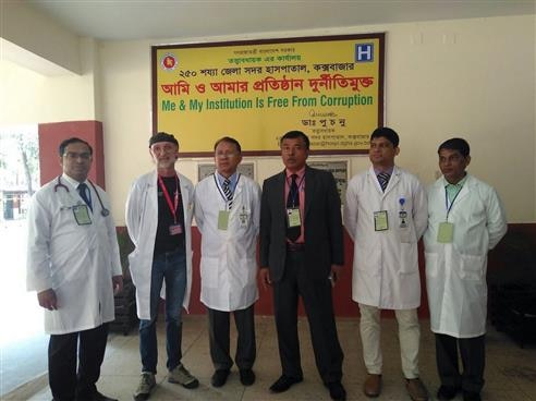 SHA expert posing for a photo with medical staff.  