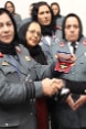 : A dozen of colleagues stand on the side of the General Rasooly