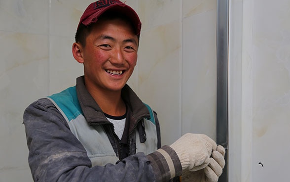 Tsegmid in his work clothes