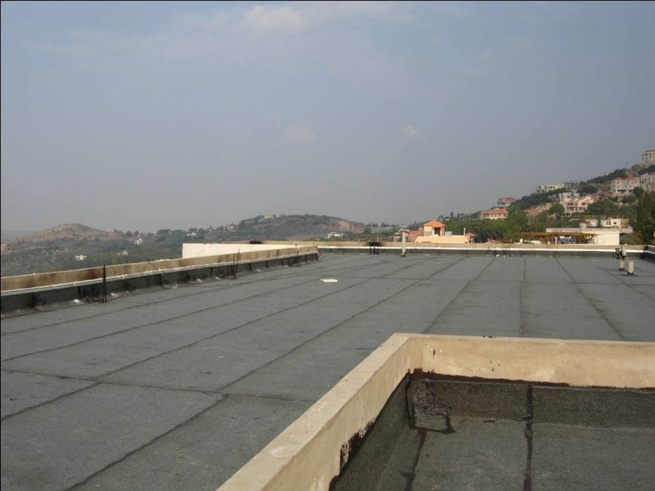A freshly asphalted roof stops water getting in.