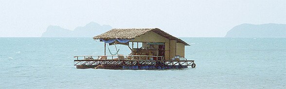 Image of a house floating on the sea