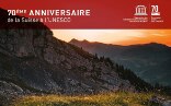 Das Logo der Konferenz. Im Hintergrund ist eine typische schweizer Berglandschaft zu sehen.