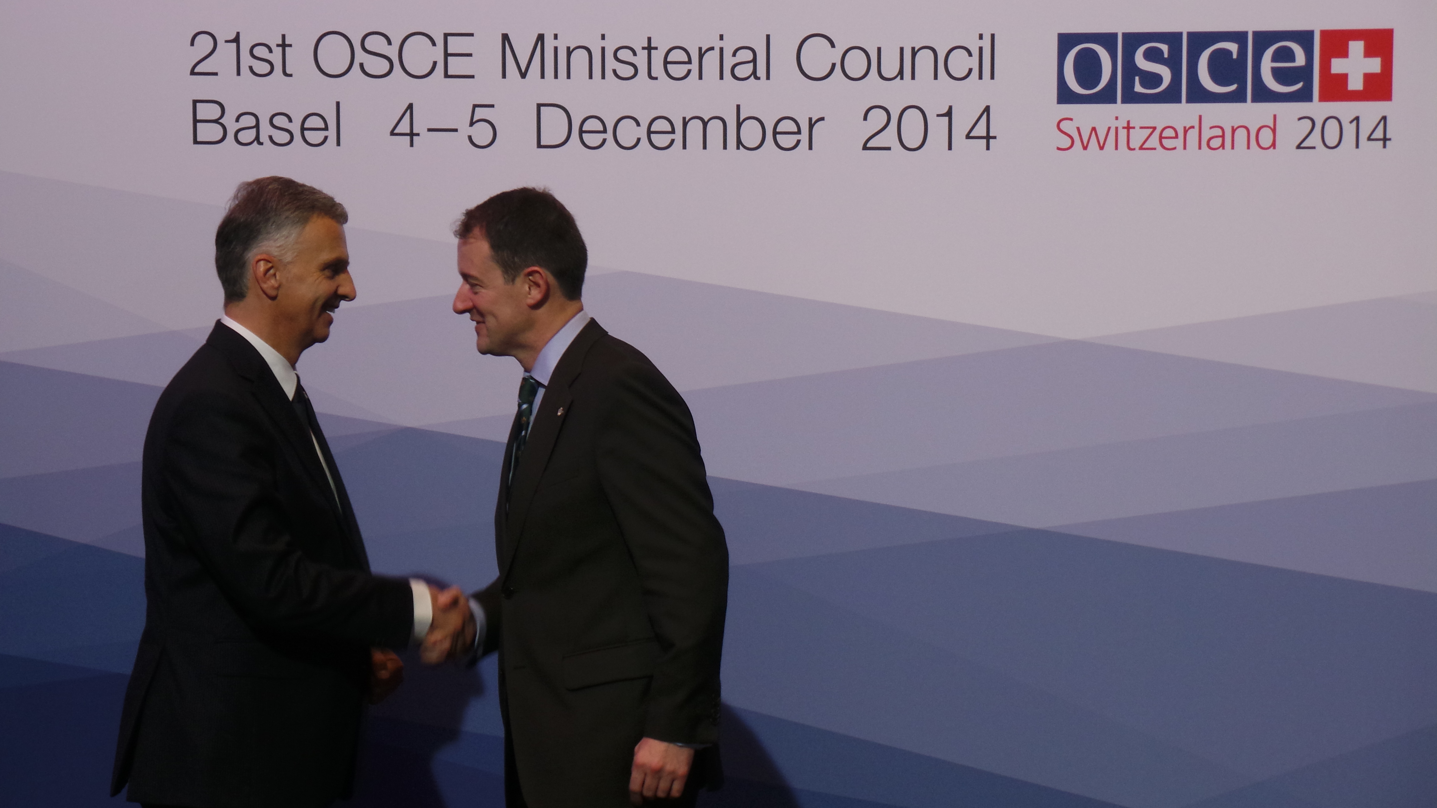 The President of the Swiss Confederation, Didier Burkhalter, greets Seán Sherlock, Minister for Development, Trade Promotion and North-South Cooperation in Ireland at the OSCE Ministerial Council 2014 in Basel