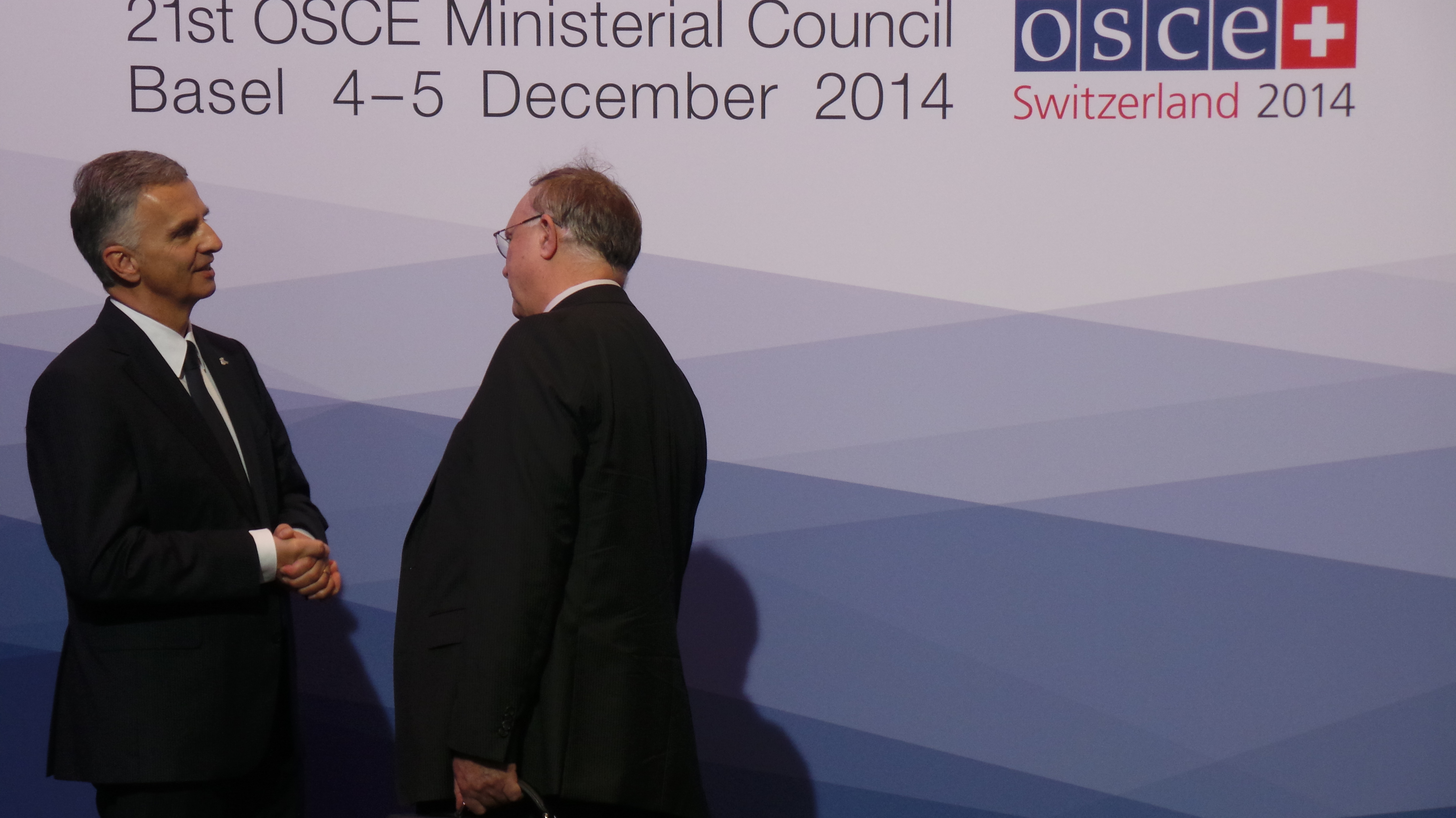 The President of the Swiss Confederation, Didier Burkhalter, greets David Gordon Stuart, Permanent Representative to the OSCE in Australia at the OSCE Ministerial Council 2014 in Basel