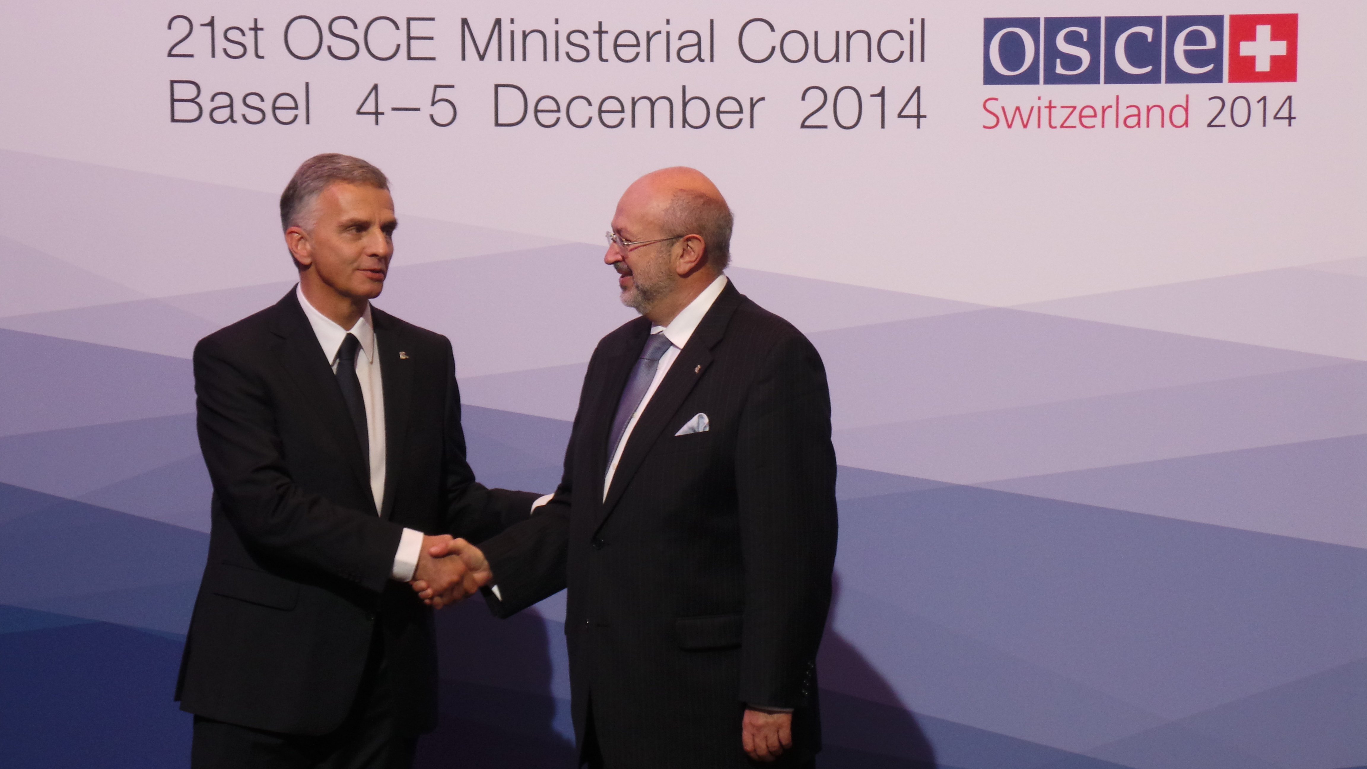 The President of the Swiss Confederation, Didier Burkhalter, greets Lamberto Zannier, Secretary General at the OSCE Ministerial Council 2014 in Basel