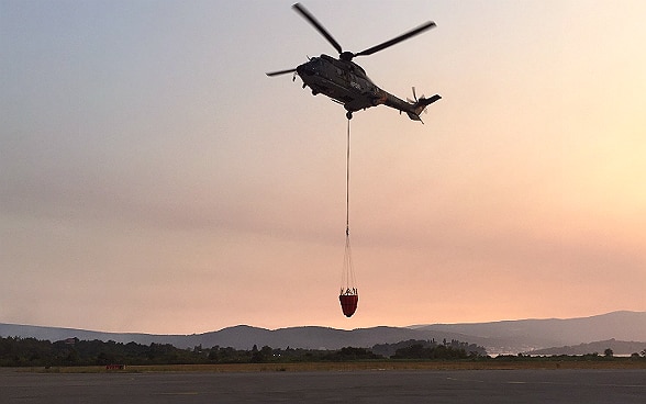 Switzerland is dispatching a Swiss army helicopter  and a humanitarian team.