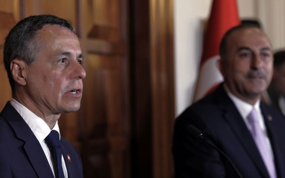 Foreign Minister Ignazio Cassis and Turkey's Foreign Minister Mevlüt Çavuşoğlu speak to the media after their talks in Ankara.