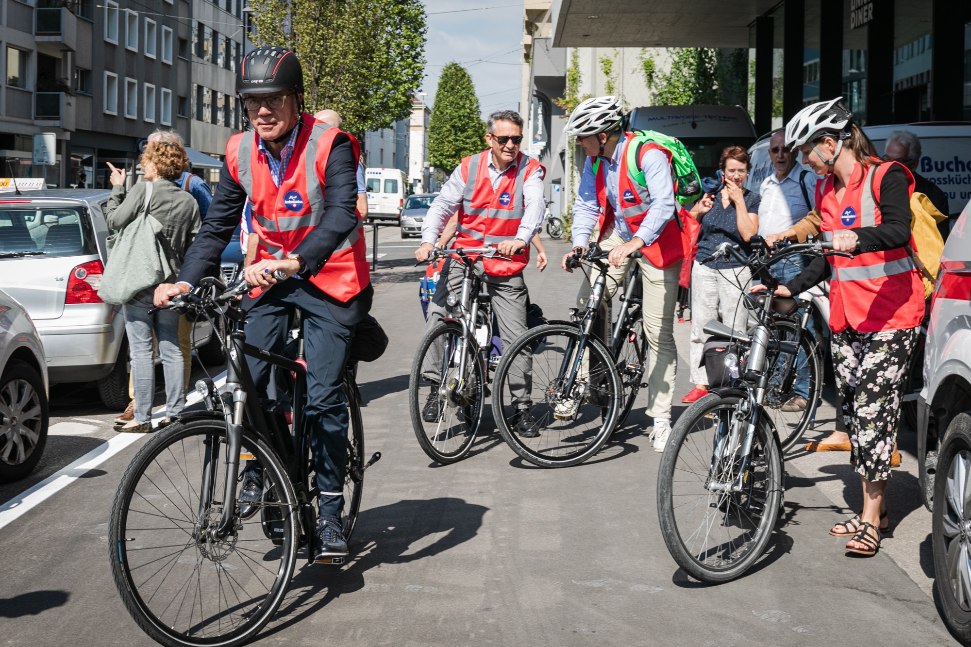 Swiss ambassadors on e-bikes.