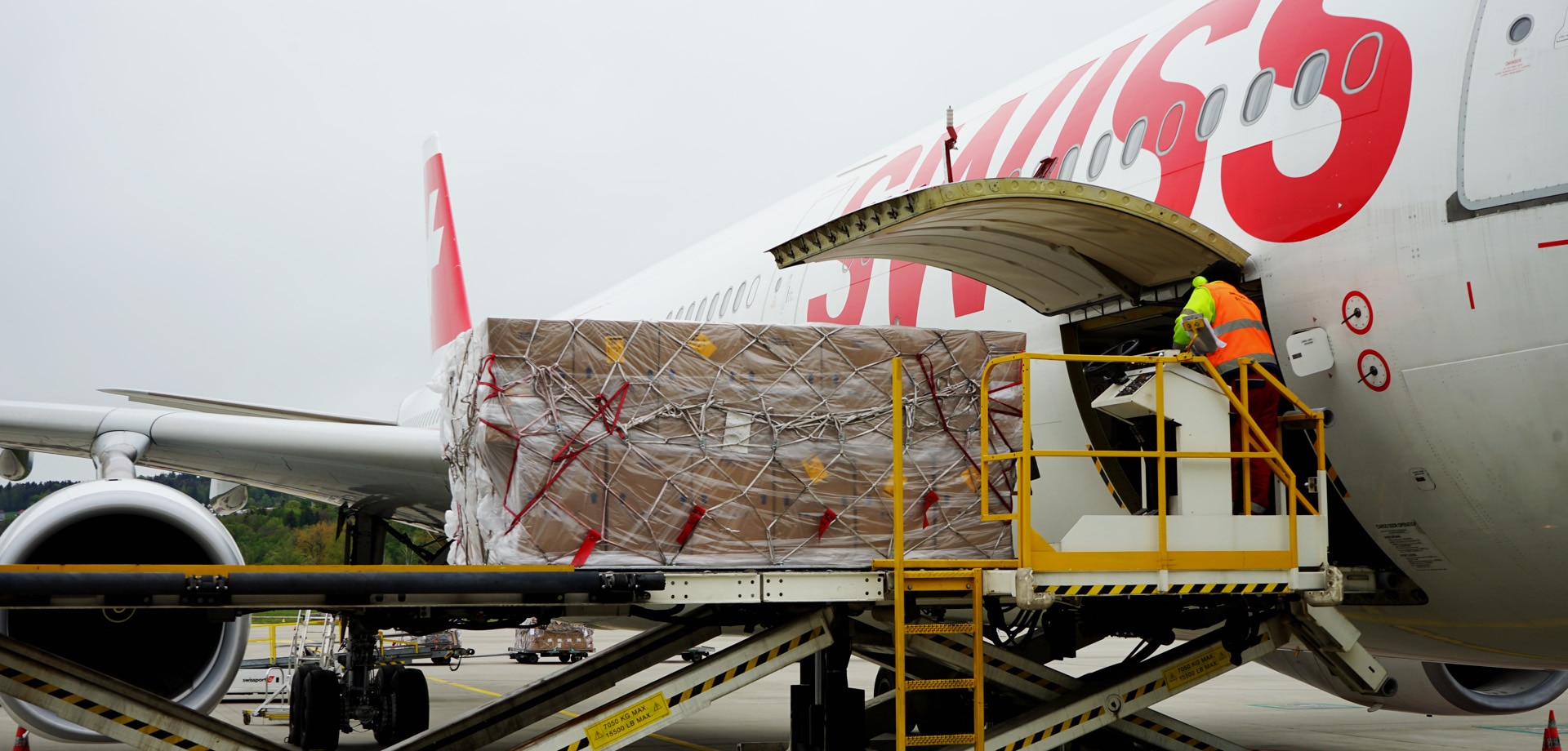 13 tonnes of material are loaded into a Swiss Airbus 330. 