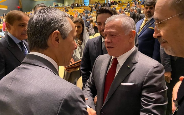 Handshake with Jordan's King Abdallah II.