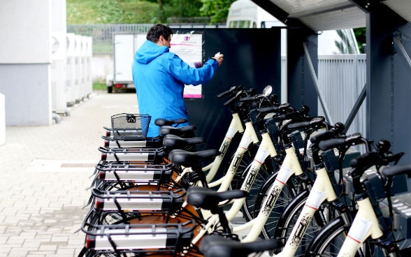 A man renting an e-bike.