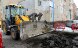 Construction worker in excavator